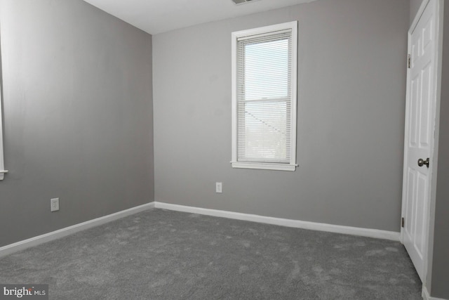 view of carpeted spare room