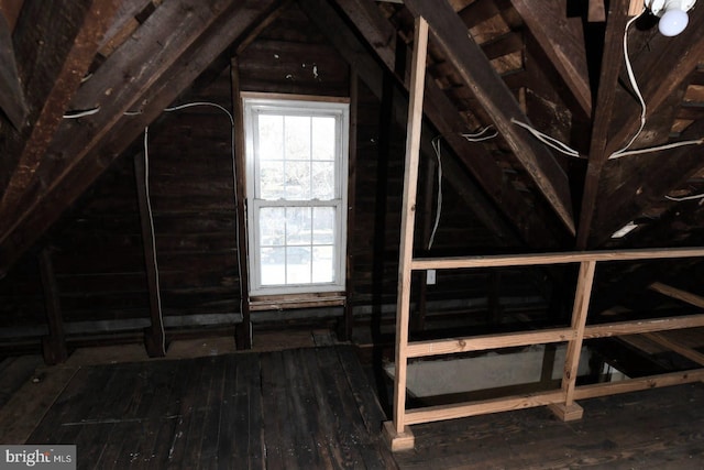 unfinished attic featuring a wealth of natural light