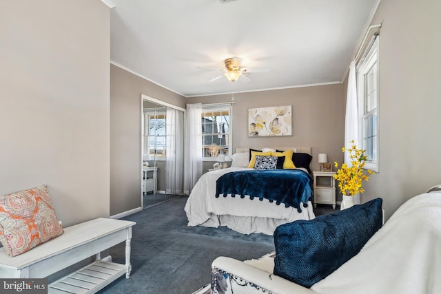 carpeted bedroom featuring crown molding and ceiling fan