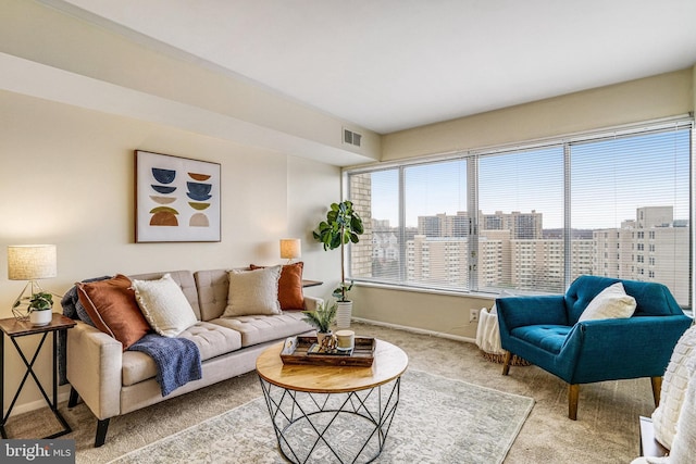 living room with light colored carpet