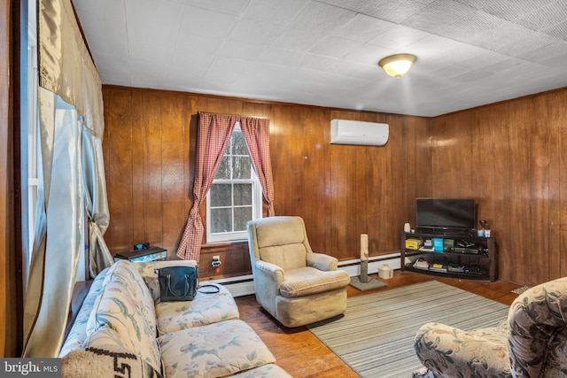 living room featuring a wall mounted air conditioner, hardwood / wood-style flooring, wood walls, and baseboard heating