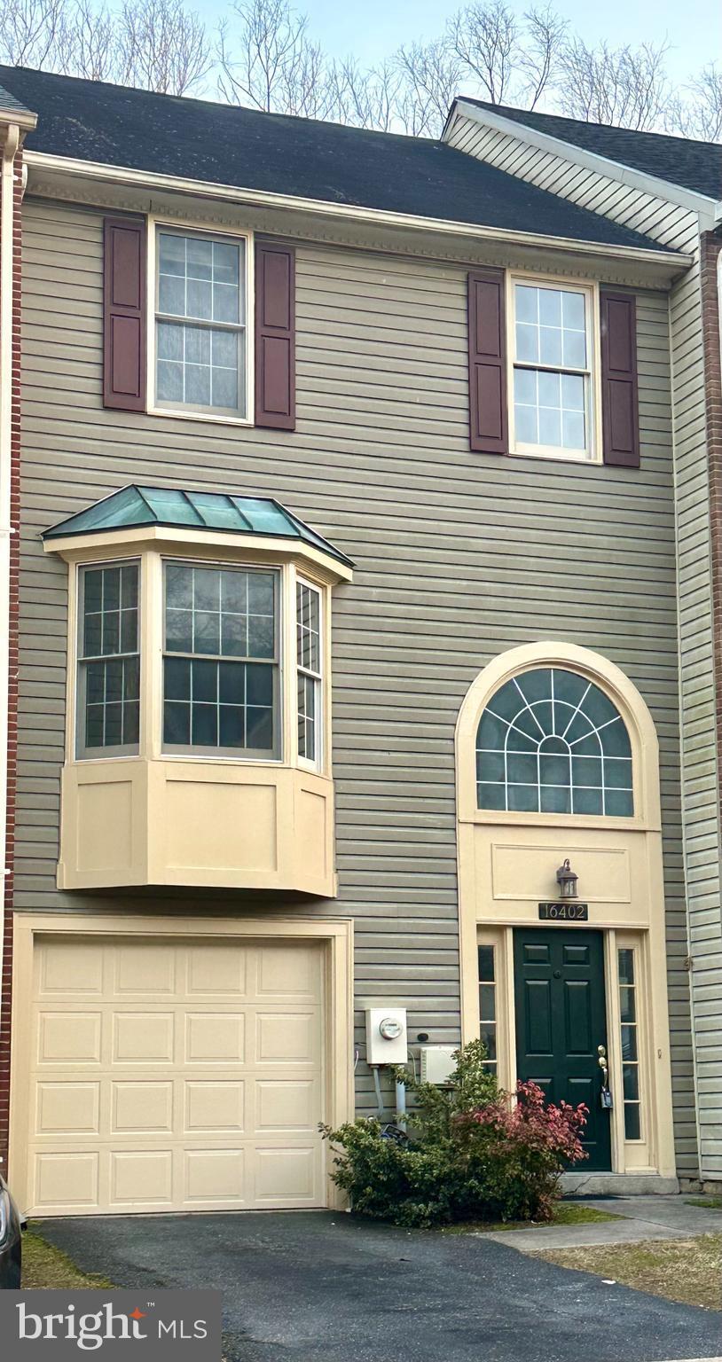 view of property featuring a garage