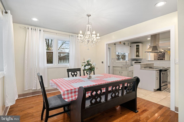 1034 Excelsior Dr, Upper Chichester, PA 19014 - dining area with sink and light hardwood / wood-style flooring
