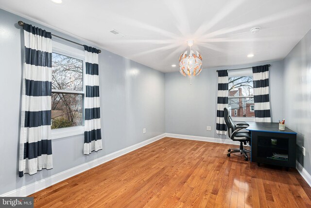 1034 Excelsior Dr, Upper Chichester, PA 19014 - office area featuring a notable chandelier and wood-type flooring