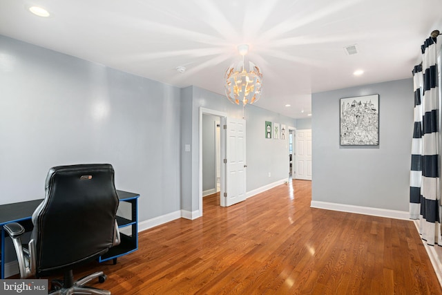 1034 Excelsior Dr, Upper Chichester, PA 19014 - office space with wood-type flooring and an inviting chandelier