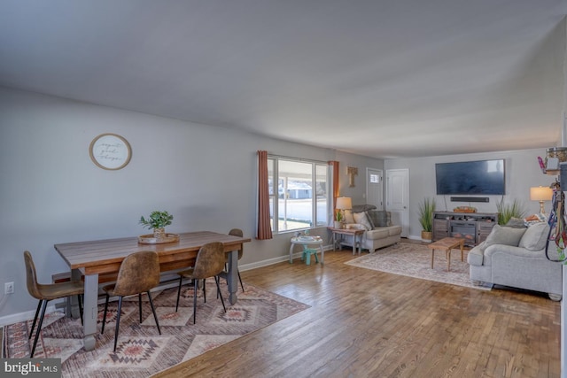 dining room with light wood-type flooring