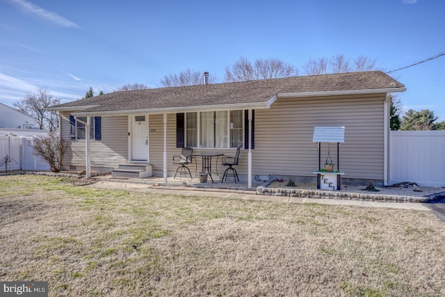 ranch-style house with a front yard