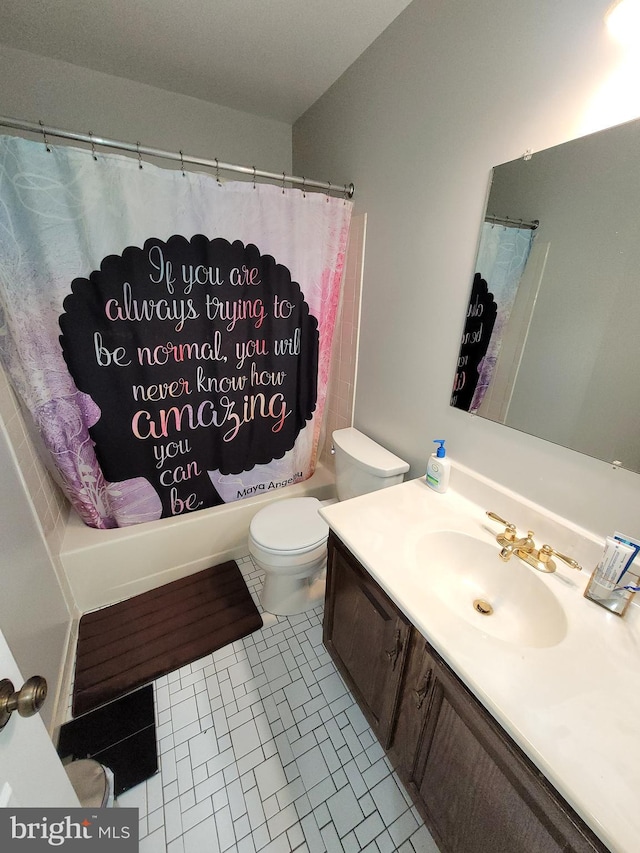 full bathroom featuring shower / tub combo, toilet, vanity, and tile patterned flooring