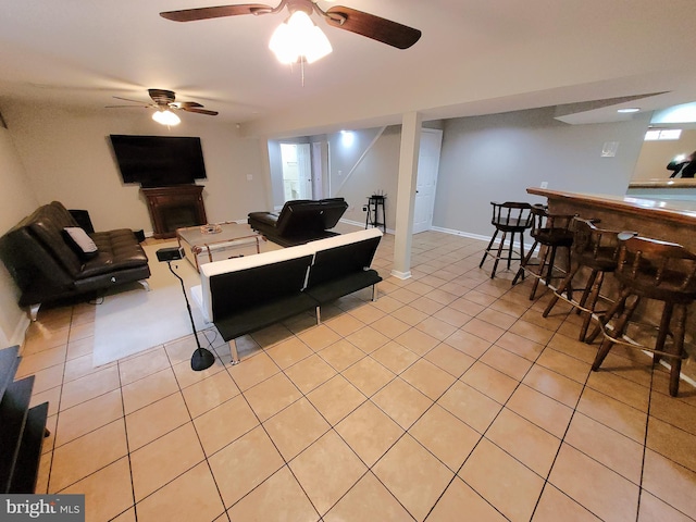 tiled living room featuring bar