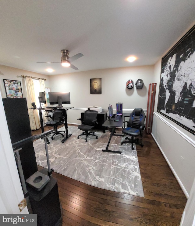 home office with hardwood / wood-style floors