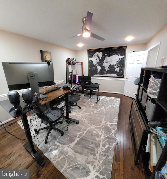 office featuring hardwood / wood-style flooring and ceiling fan