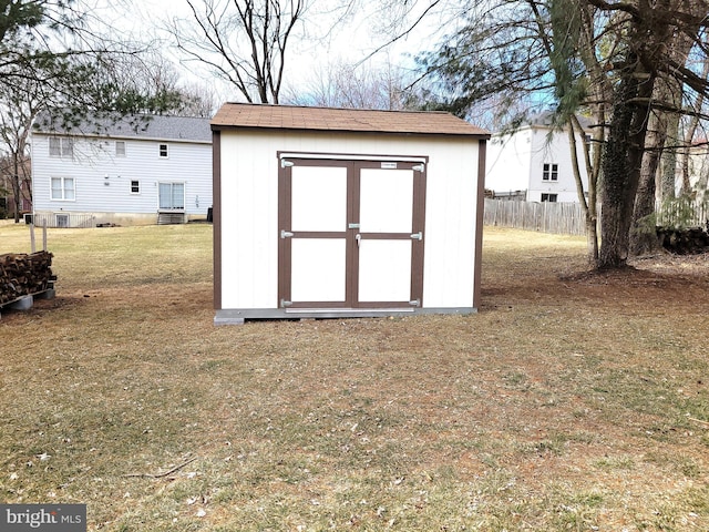 view of outdoor structure featuring a yard