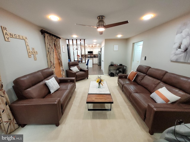 living room with ceiling fan