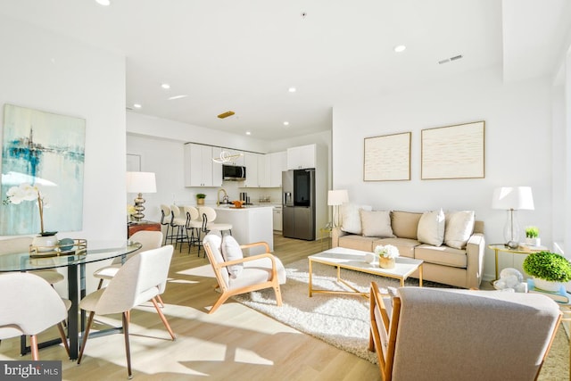 living room featuring light hardwood / wood-style floors