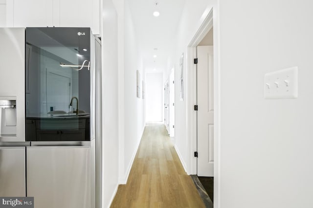 hallway featuring light wood-type flooring