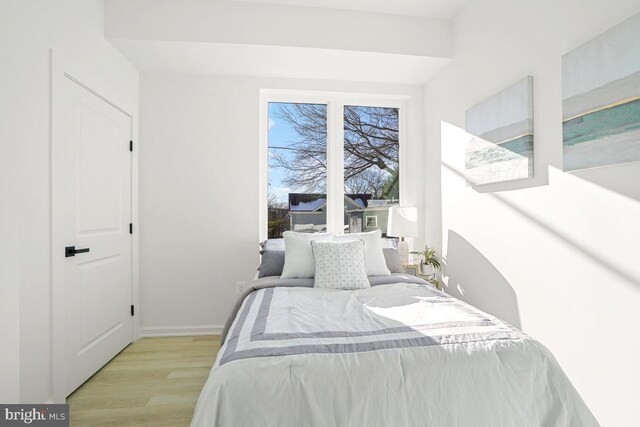 bedroom featuring light wood-type flooring