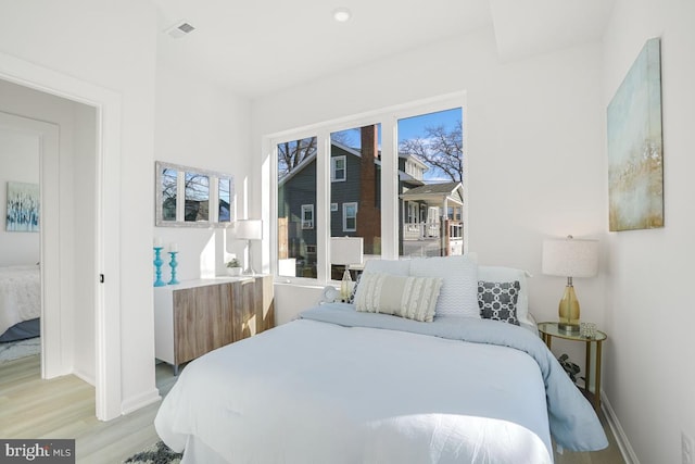 bedroom featuring light hardwood / wood-style floors