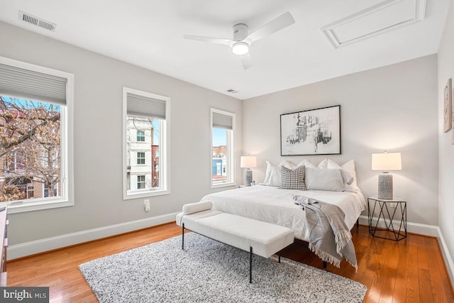 bedroom featuring wood-type flooring and ceiling fan