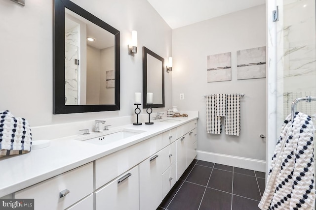 bathroom with vanity, an enclosed shower, and tile patterned flooring