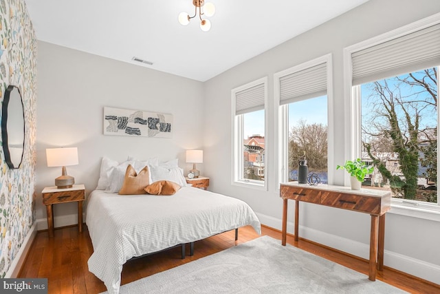 bedroom featuring hardwood / wood-style flooring