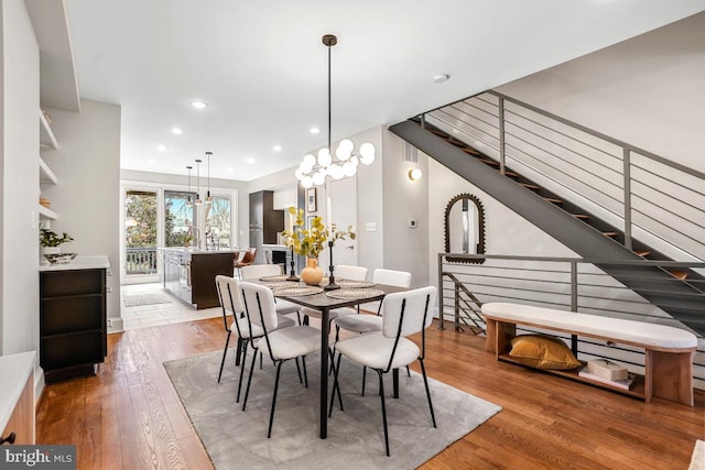 dining area with hardwood / wood-style floors