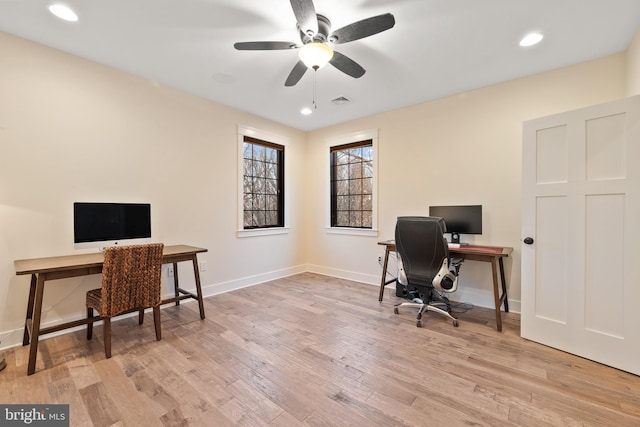 office featuring ceiling fan and light wood-type flooring