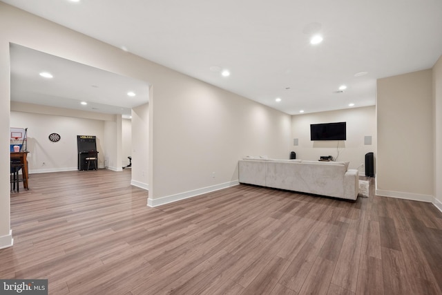 unfurnished living room with light wood-type flooring