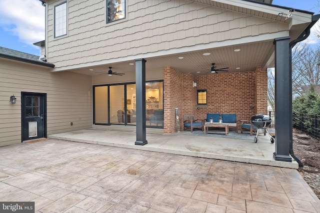 view of patio / terrace featuring outdoor lounge area, area for grilling, and ceiling fan