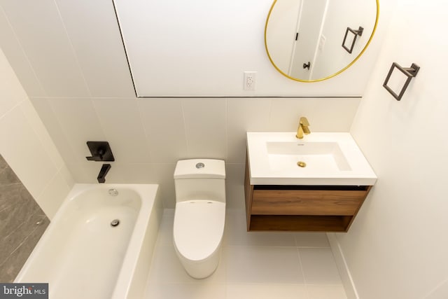 full bath featuring toilet, a bathing tub, tile patterned flooring, and vanity