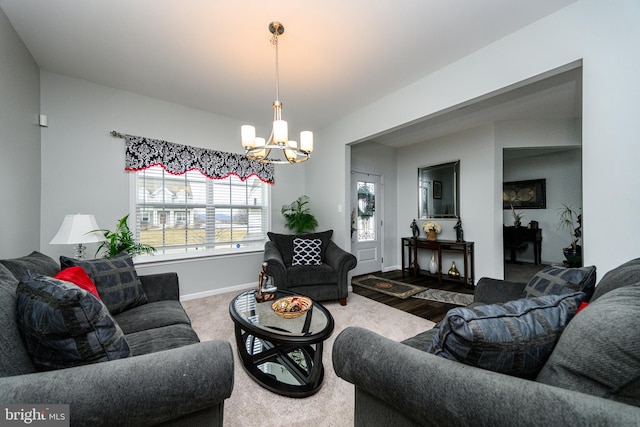 living room with an inviting chandelier