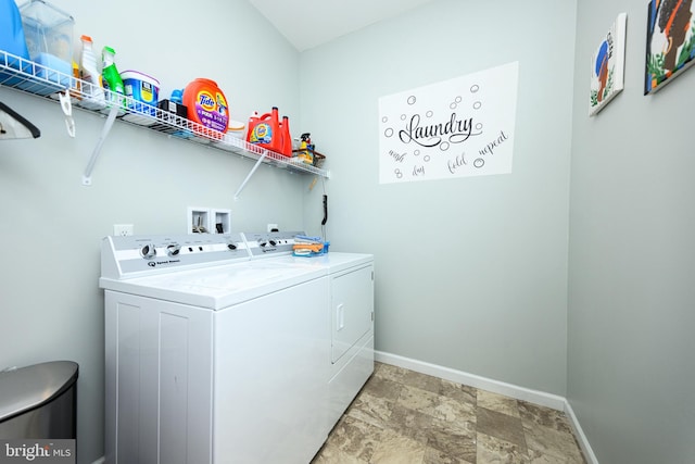 laundry room featuring separate washer and dryer