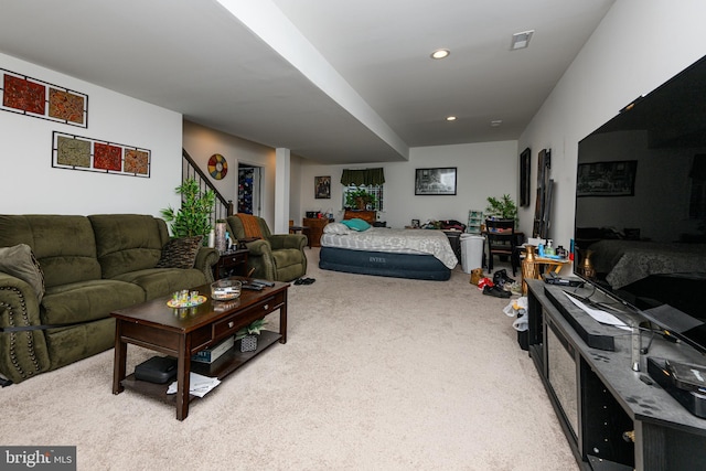 living room featuring light colored carpet