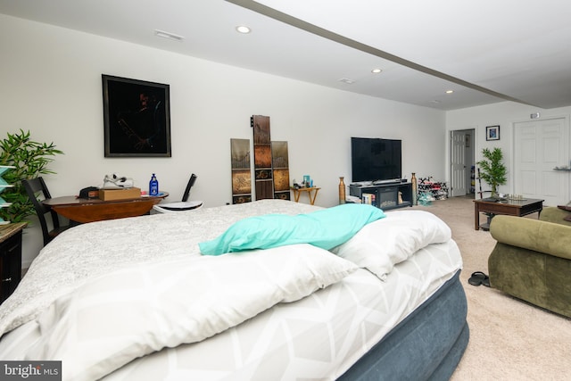 bedroom with light colored carpet