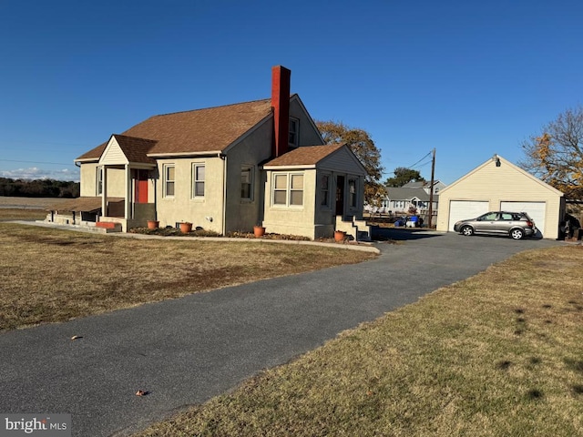 exterior space with a garage and a front yard