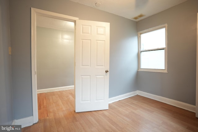 unfurnished bedroom with light hardwood / wood-style flooring