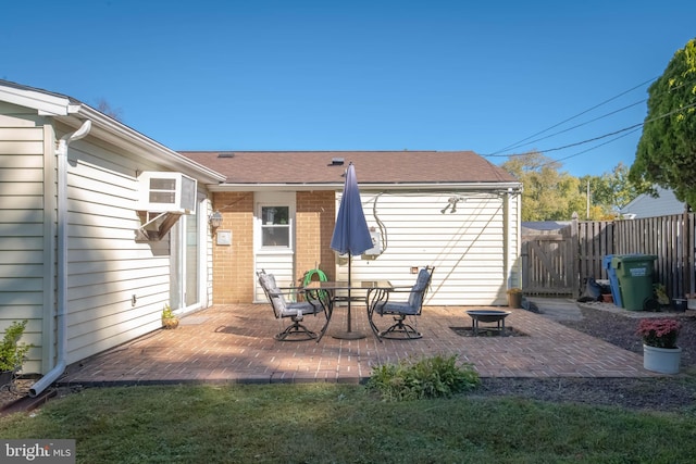 rear view of property with a patio area