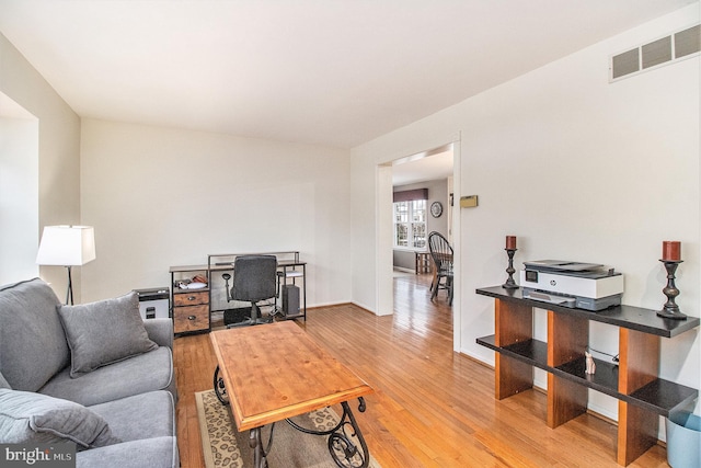 living room with wood-type flooring