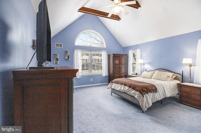 carpeted bedroom featuring ceiling fan and high vaulted ceiling