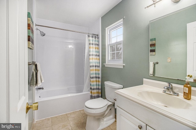 full bathroom featuring shower / bath combination with curtain, tile patterned floors, vanity, and toilet