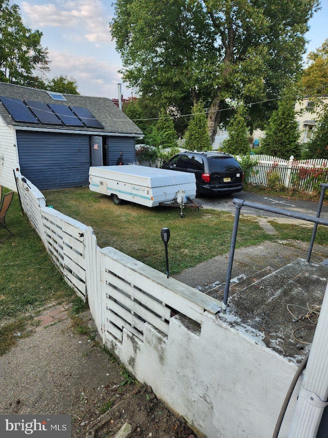 exterior space with solar panels