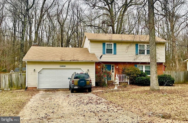 front of property with a garage