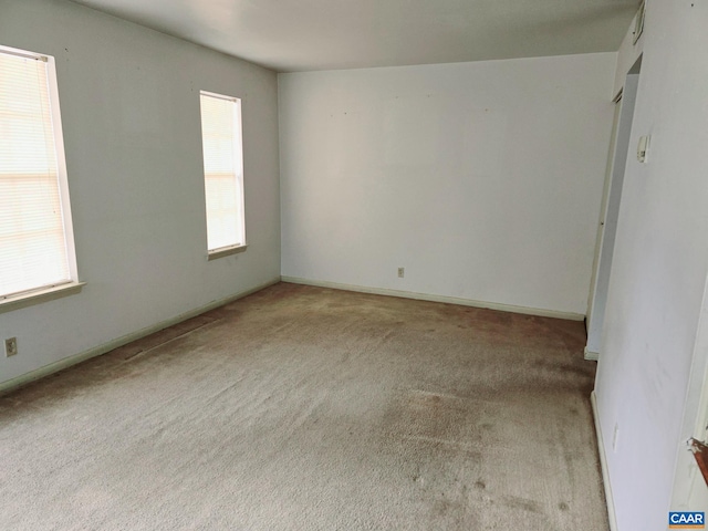 view of carpeted spare room