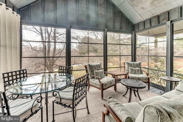 sunroom / solarium with vaulted ceiling