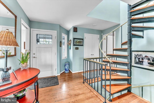 entrance foyer featuring hardwood / wood-style floors