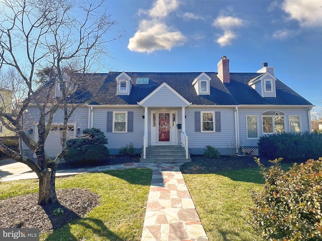 cape cod-style house with roof with shingles and a front yard