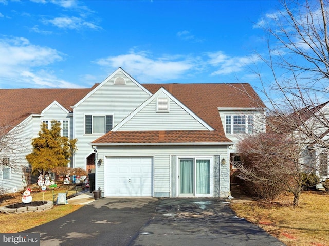 front of property featuring a garage