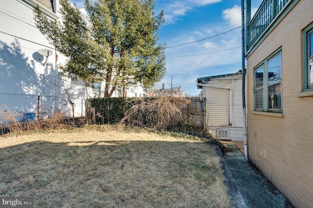 view of yard featuring fence