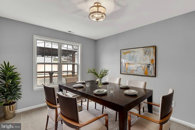 view of carpeted dining room