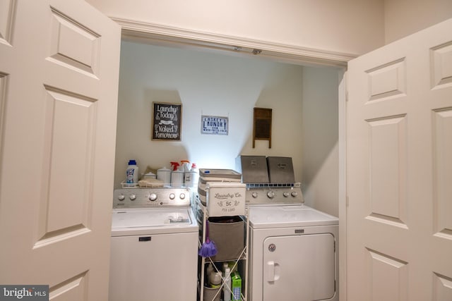 washroom featuring separate washer and dryer