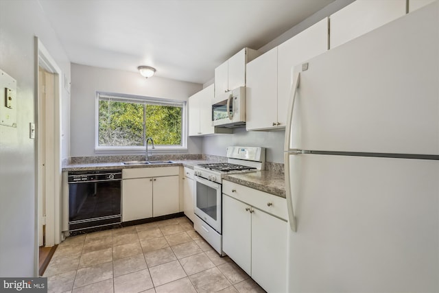 kitchen featuring light tile patterned flooring, white appliances, sink, and white cabinets